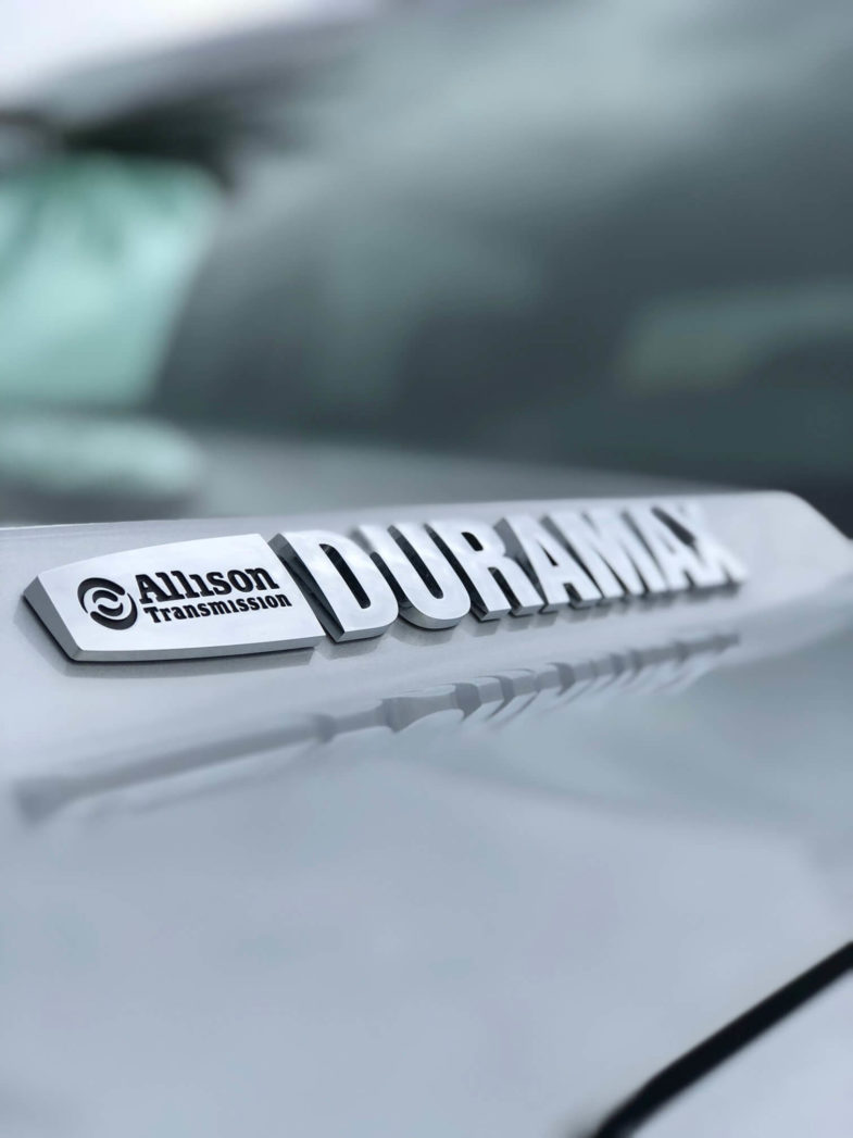 A Duramax logo with the words Allison Transmission to the left