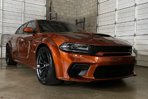 Upgrade Your Ride At Our Performance Shop In Gilbert AZ with Ace Performance Automotive image of rust color performance vehicle that just was in the shop