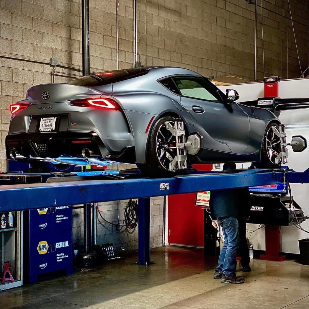 a toyota supra being aligned in Ace Performance Automotive in Gilbert AZ